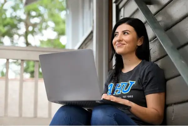 AHU student taking registering for an online course